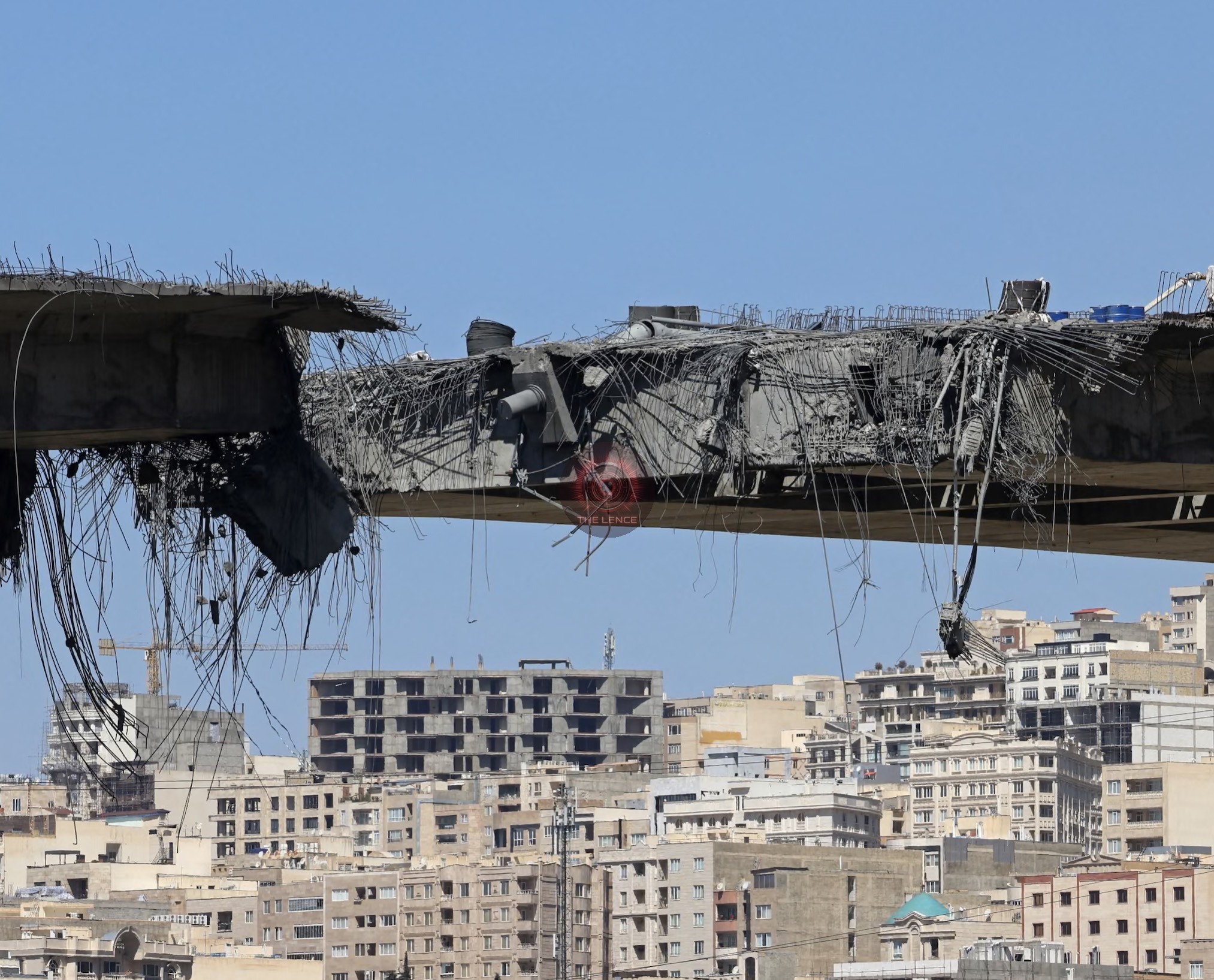 Iranians fear what comes next after US strike on Karaj bridge.